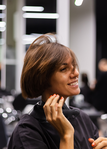 professional-girl-hairdresser-makes-client-haircut-girl-is-sitting-mask-beauty-salon